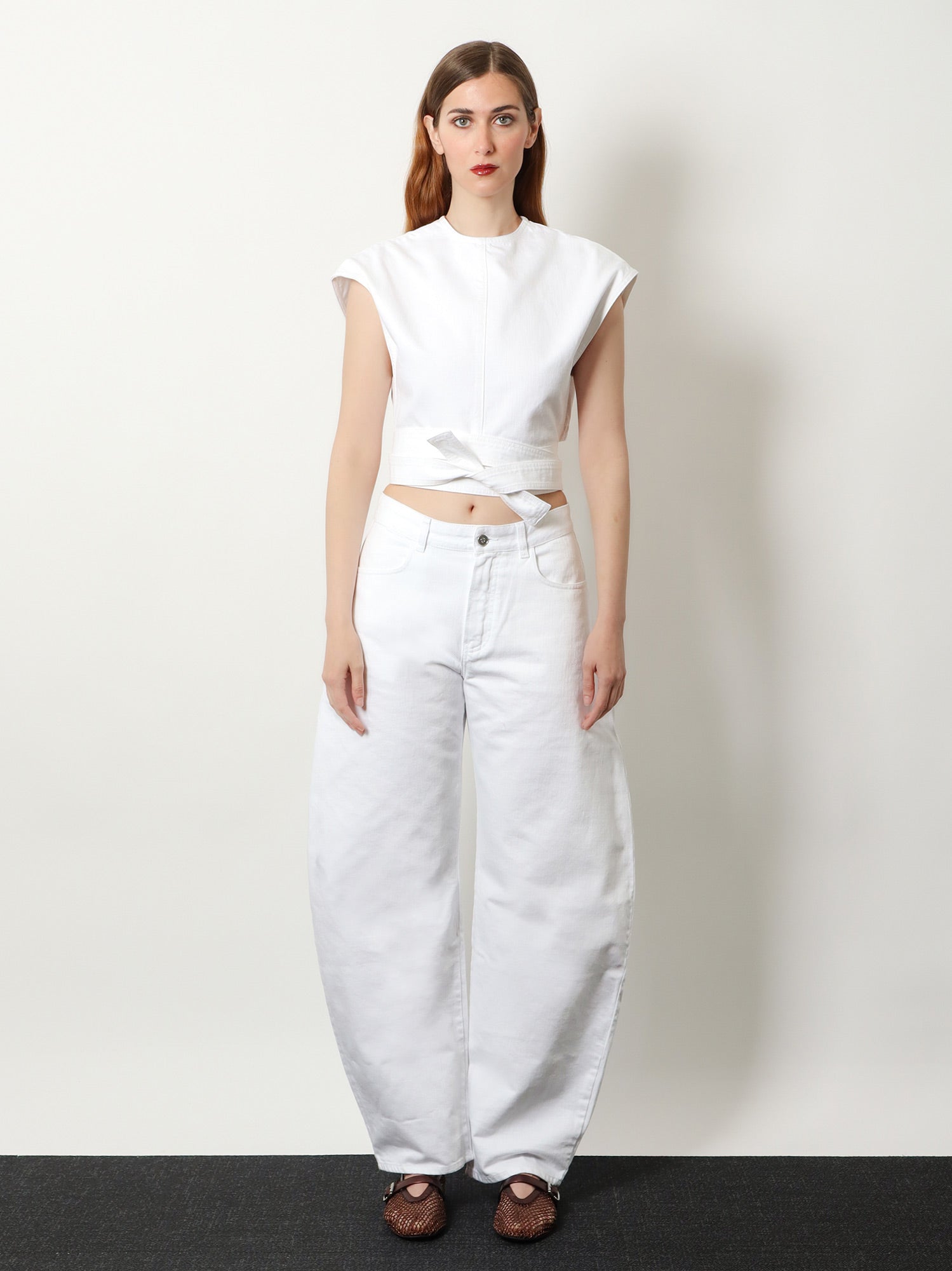 Alaïa Curved Denim Trousers