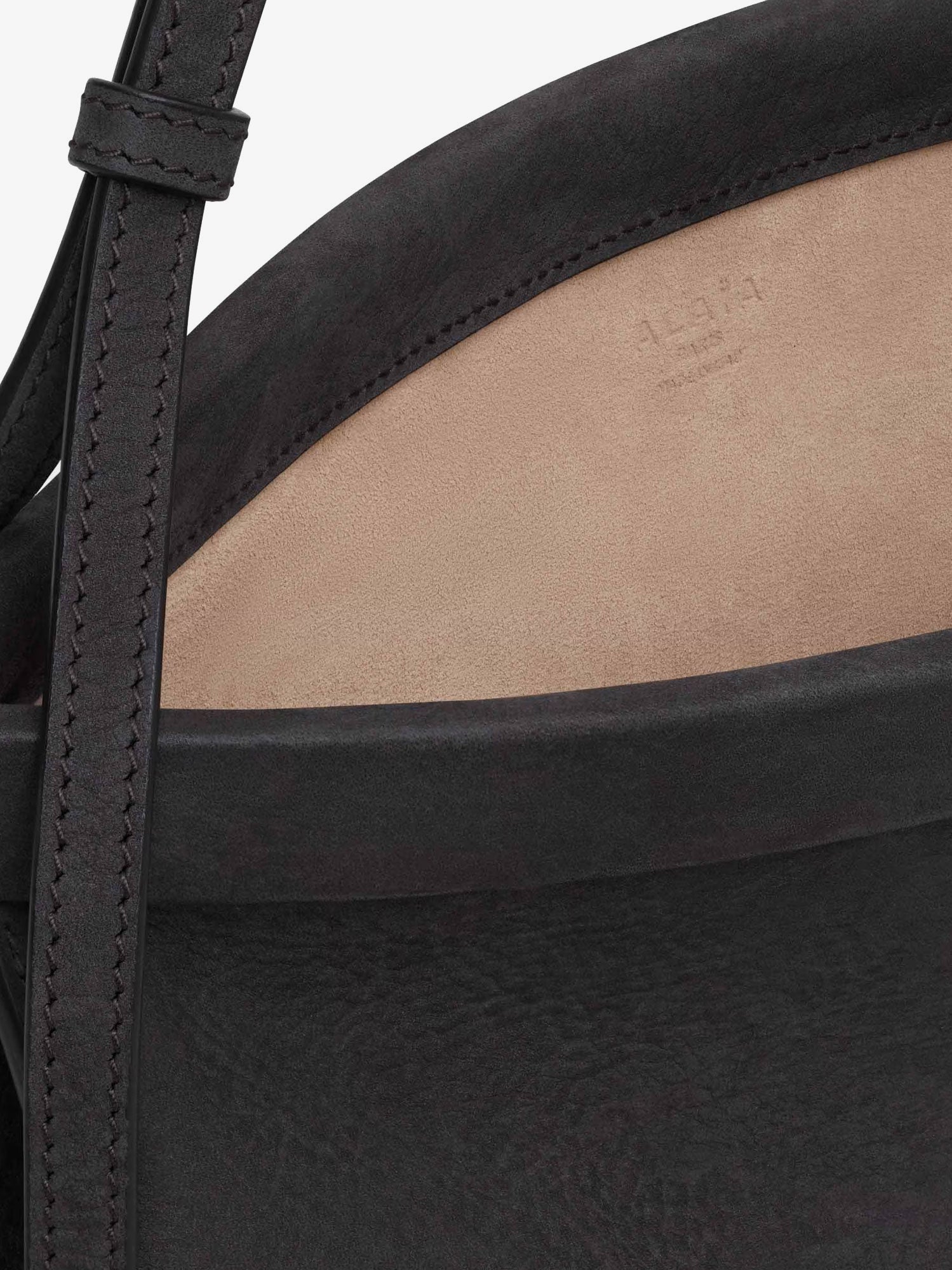 Alaïa East West Leather Shoulder Bag With Engraved Lettering Logo