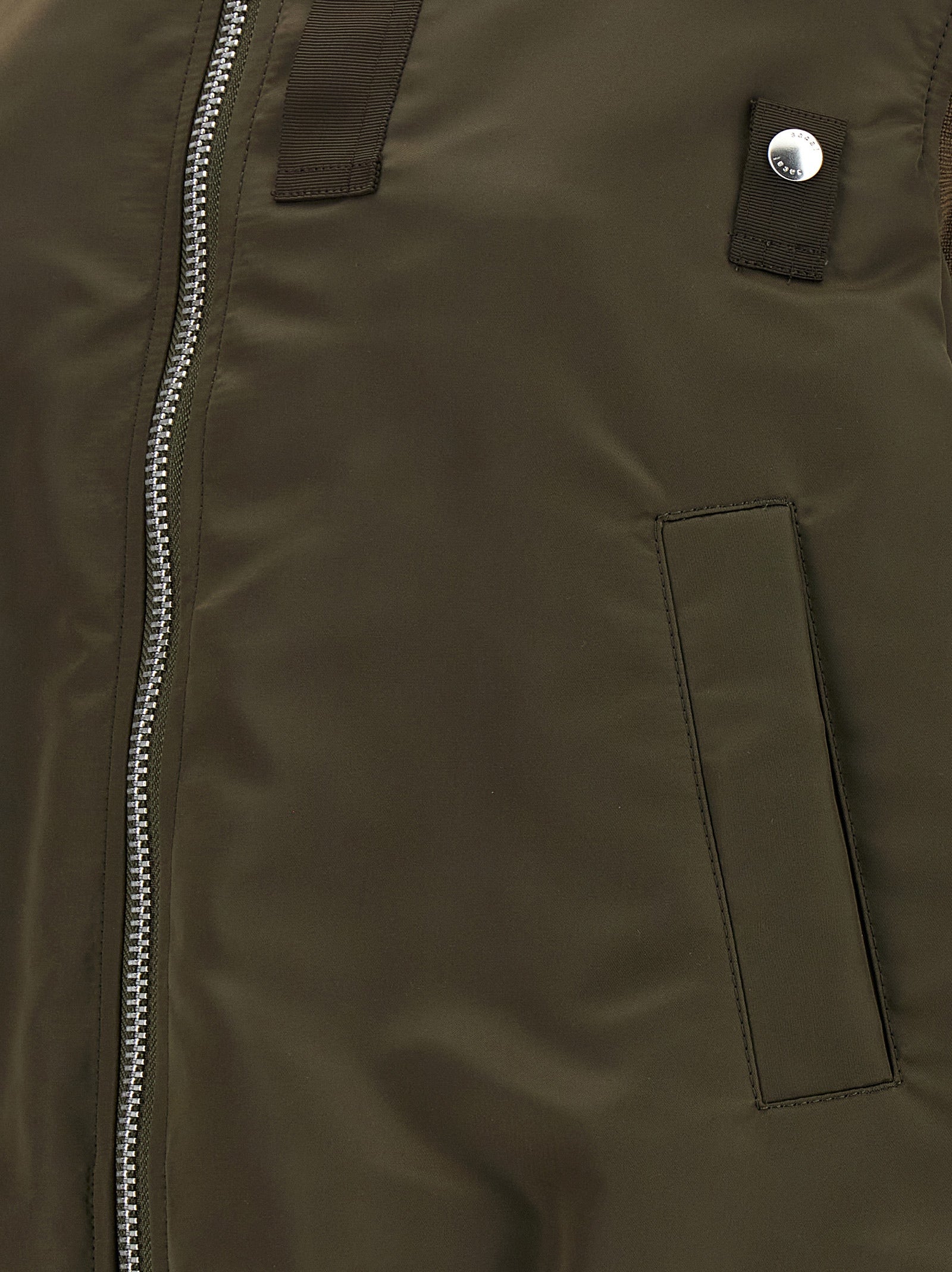 Sacai Asymmetrical Hem Vest