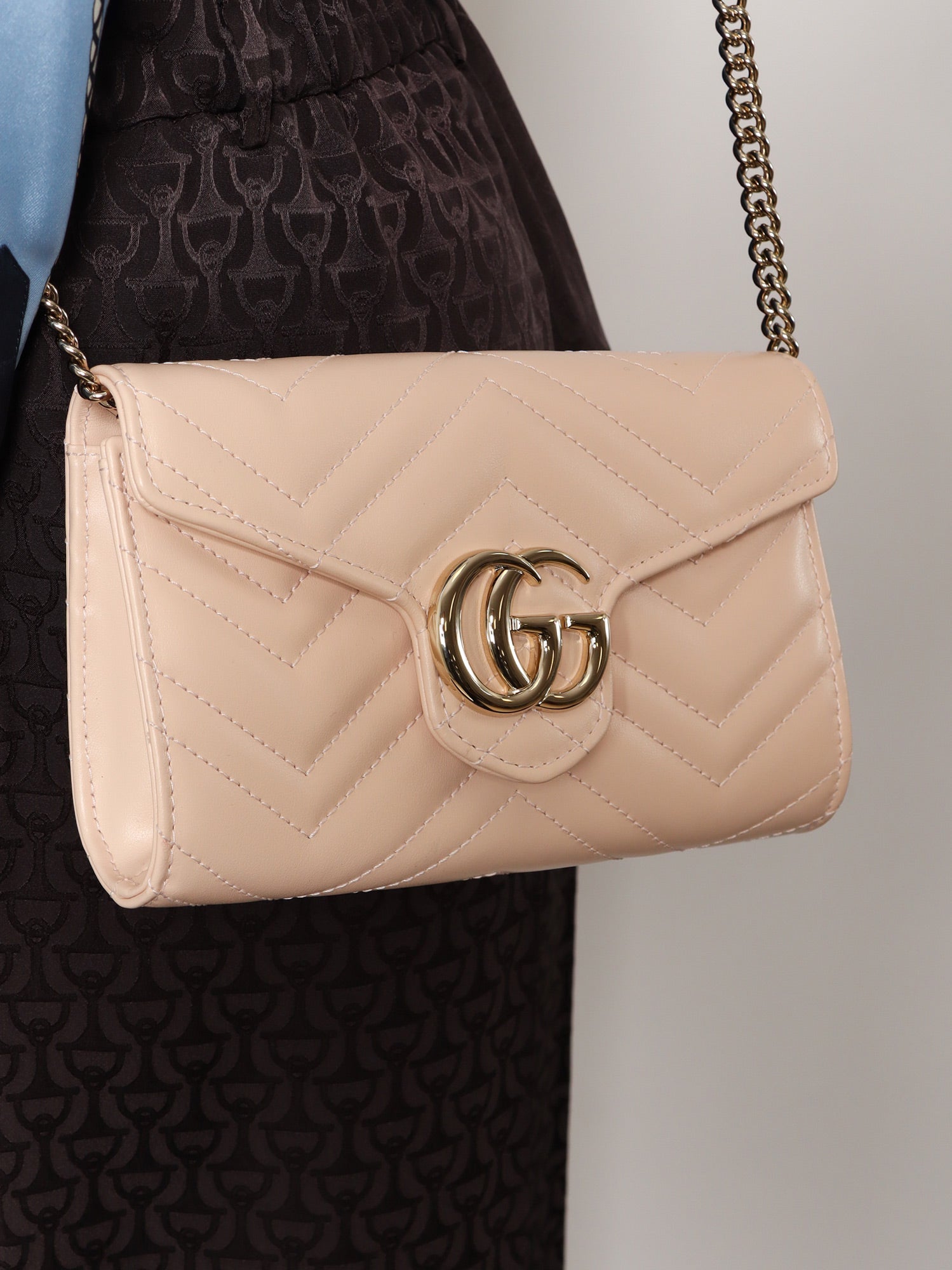 Gucci Quilted Leather Crossbody Bag With Metal Gg Logo