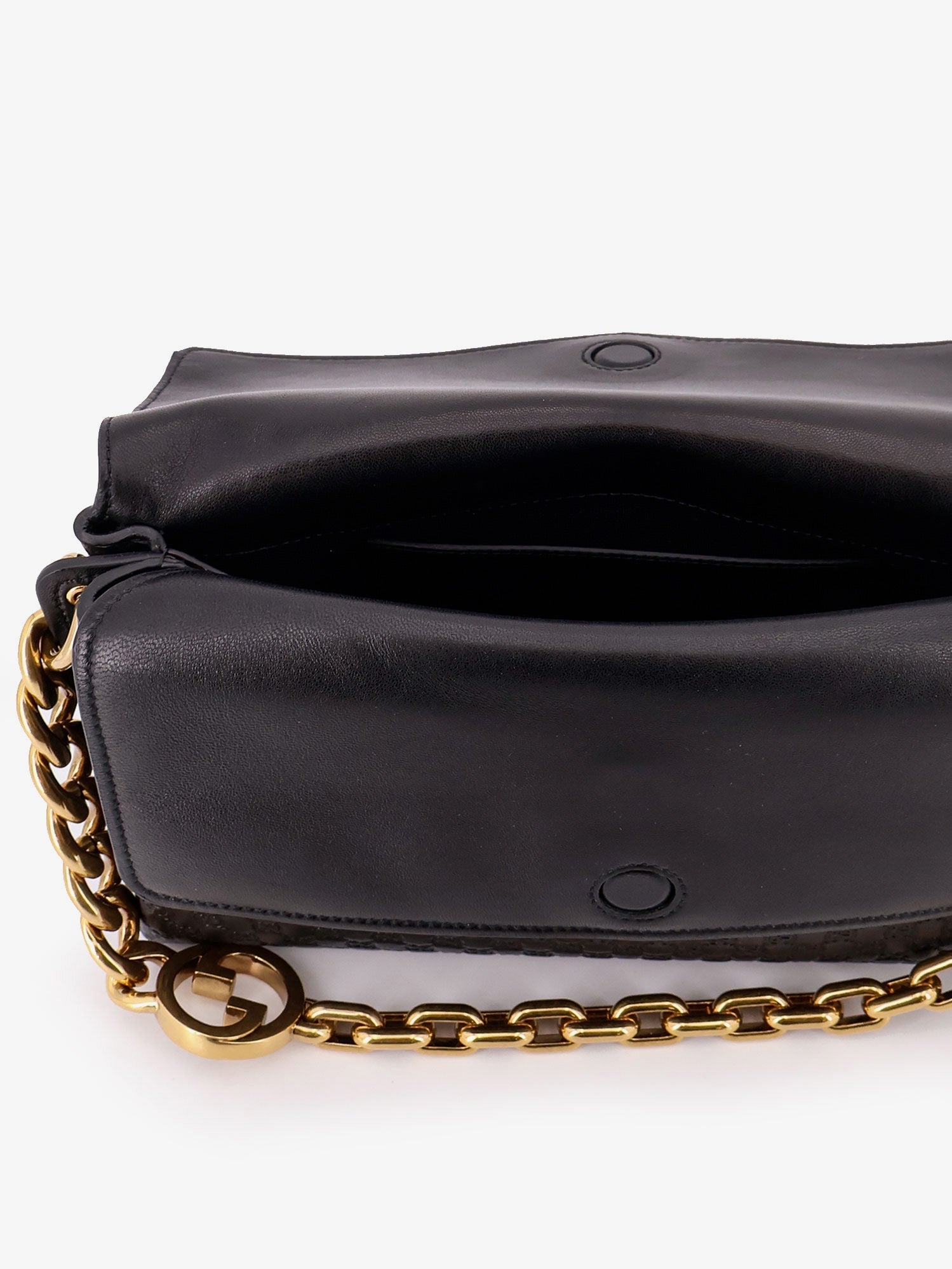 Gucci Leather Crossbody Bag With Embossed Gg Motif