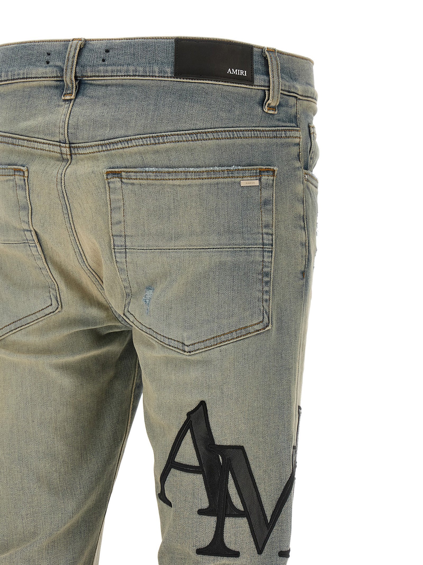 Amiri 'Staggered Logo' Jeans